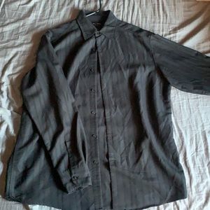 this is a black large button up that is black